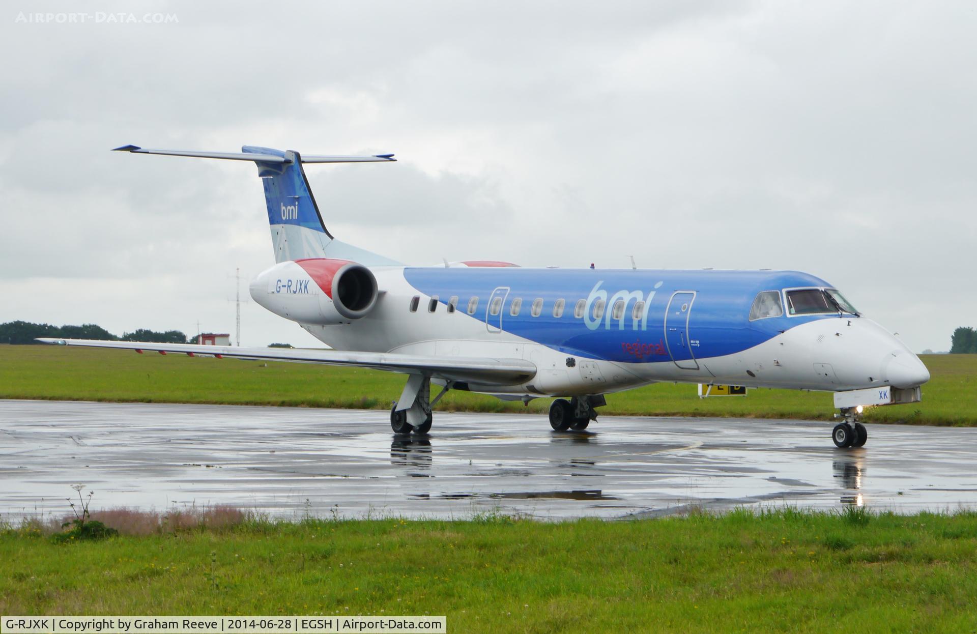 G-RJXK, 2001 Embraer ERJ-135ER (EMB-135ER) C/N 145494, Just landed on a wet day.