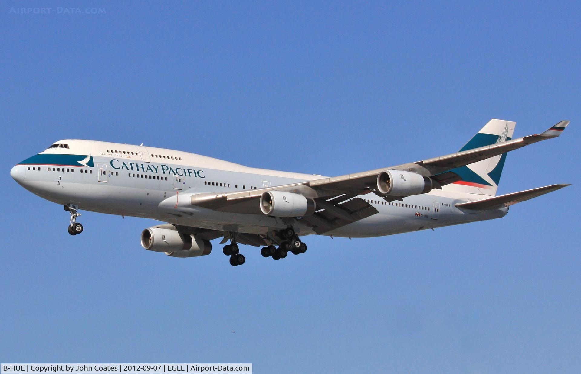 B-HUE, 1993 Boeing 747-467 C/N 27117, Arriving 27R