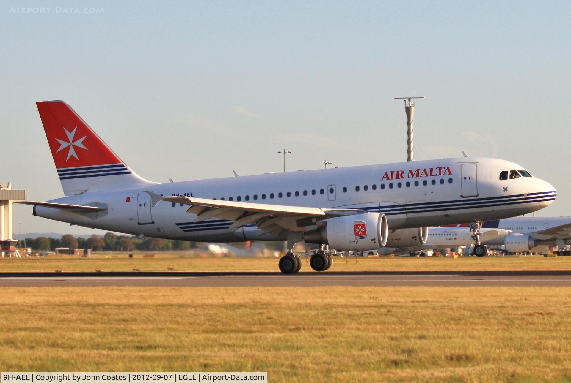 9H-AEL, 2004 Airbus A319-111 C/N 2332, Landing 27R