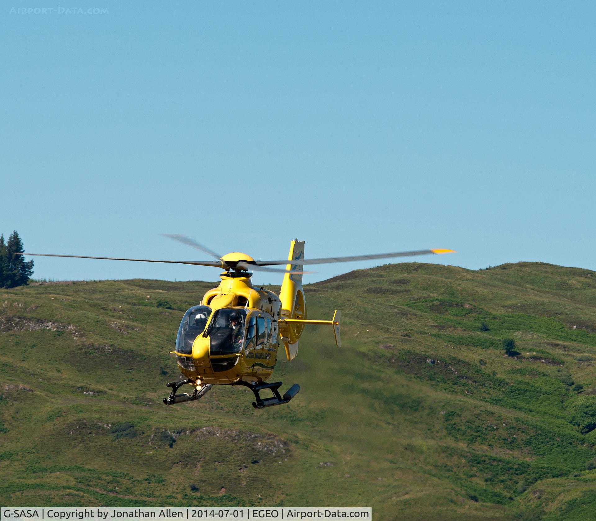 G-SASA, 2000 Eurocopter EC-135T-2 C/N 0147, Scottish Ambulance Service Eurocopter lifting-off from Oban on its way to Barra.