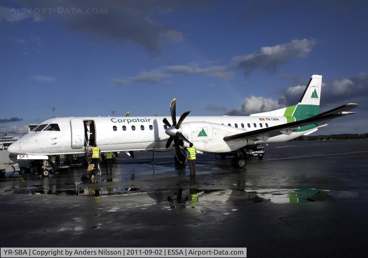 YR-SBA, 1996 Saab 2000 C/N 2000-038, Parked at terminal 3. Flying for Skyways.