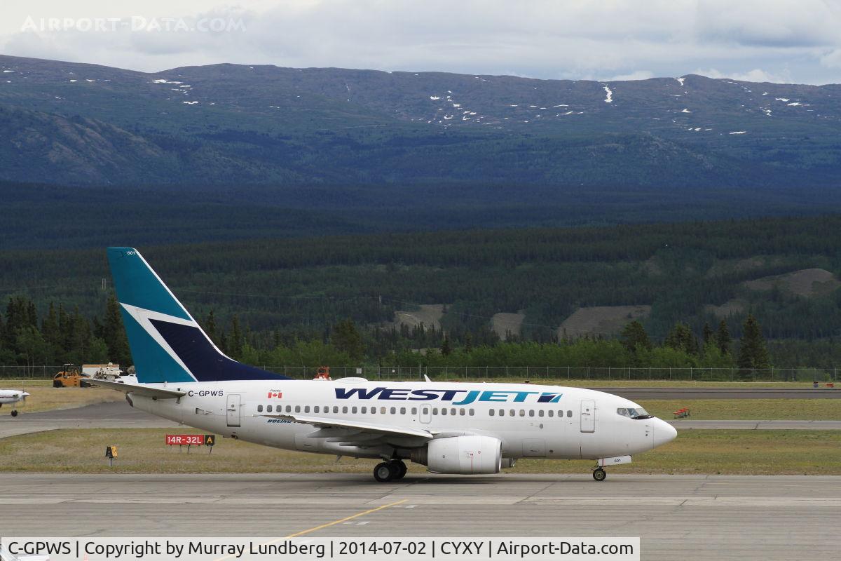 C-GPWS, 2005 Boeing 737-6CT C/N 34284, Taxiing to the terminal at Whitehorse, Yukon.
