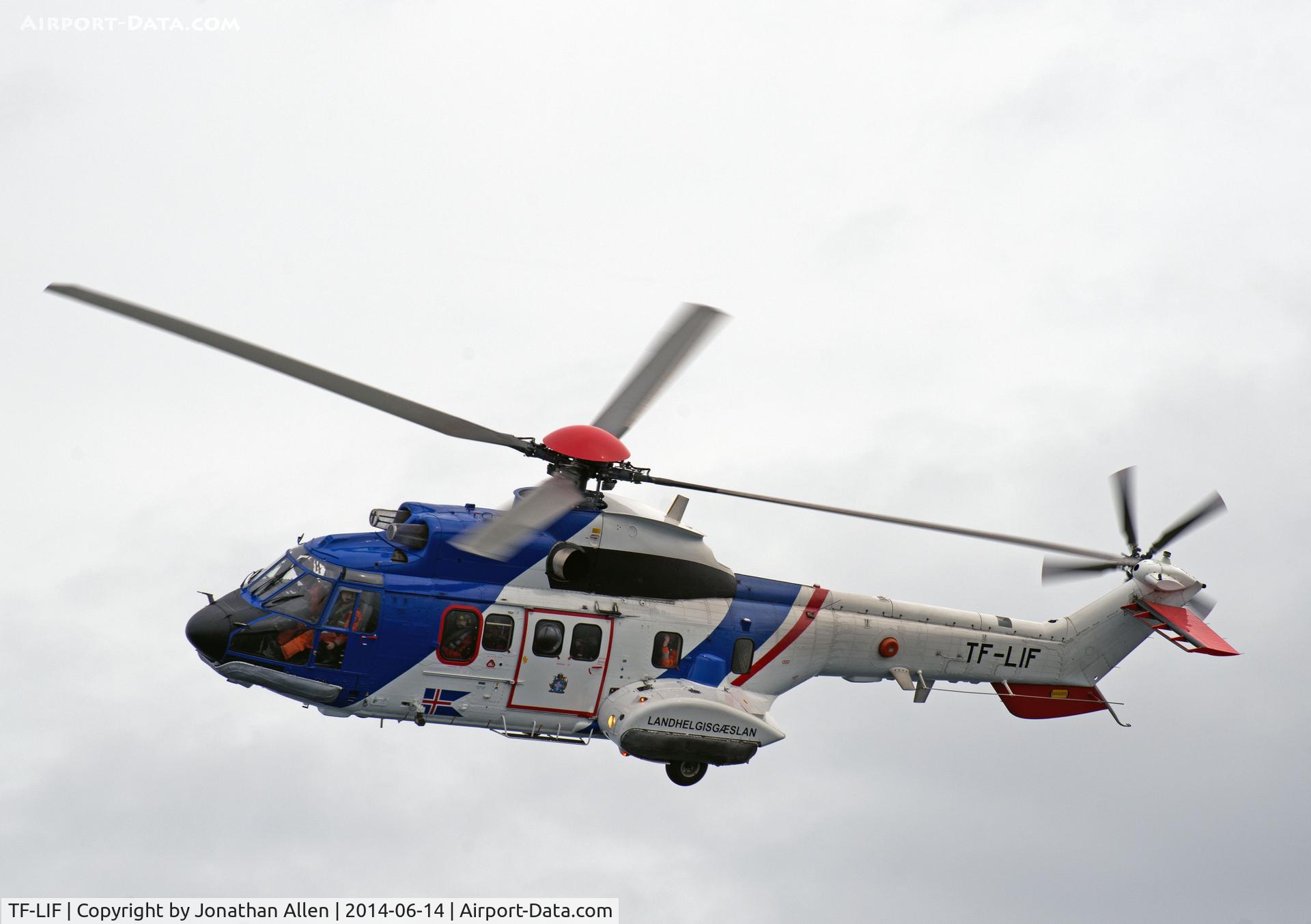 TF-LIF, 1986 Aerospatiale AS-332L-1 Super Puma C/N 2210, The Icelandic Coastguard take a look at the MV Island Sky off Reykjavik.