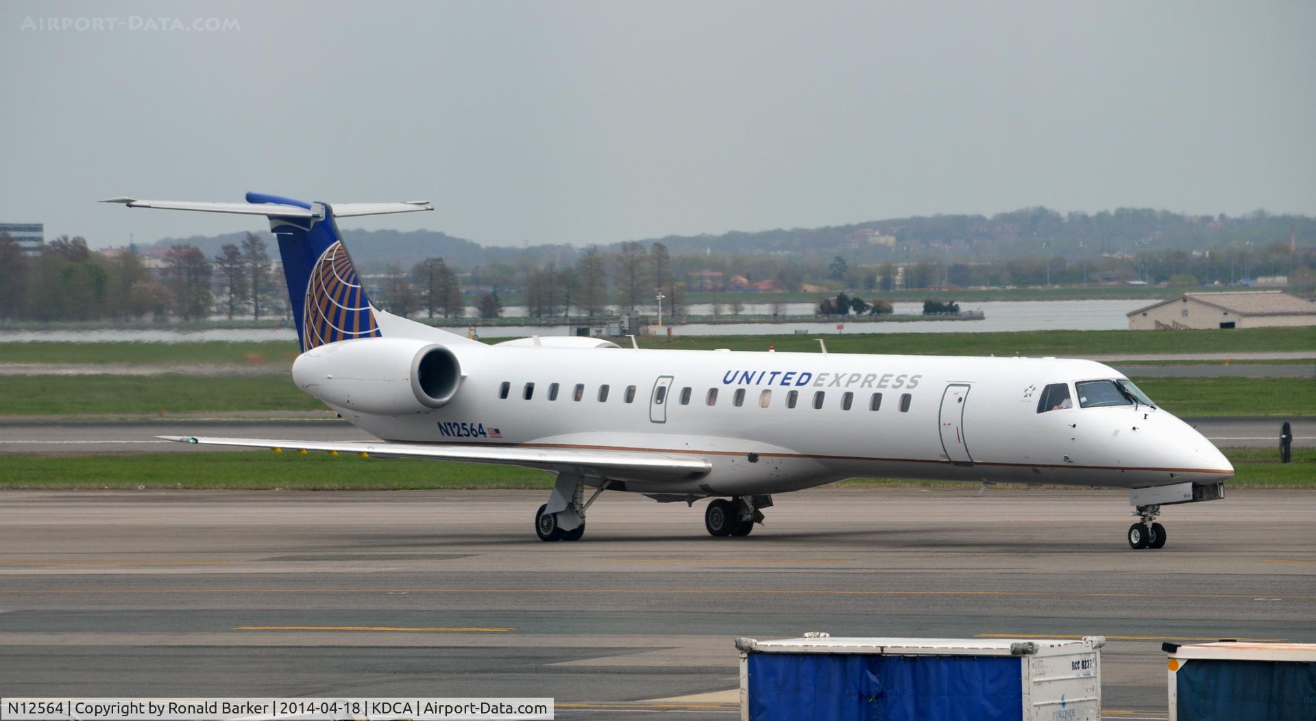 N12564, 2002 Embraer ERJ-145LR (EMB-145LR) C/N 145618, Taxi National Airport
