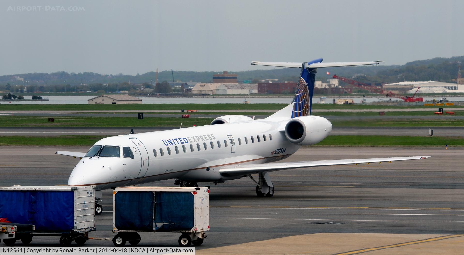 N12564, 2002 Embraer ERJ-145LR (EMB-145LR) C/N 145618, Taxi National Airport