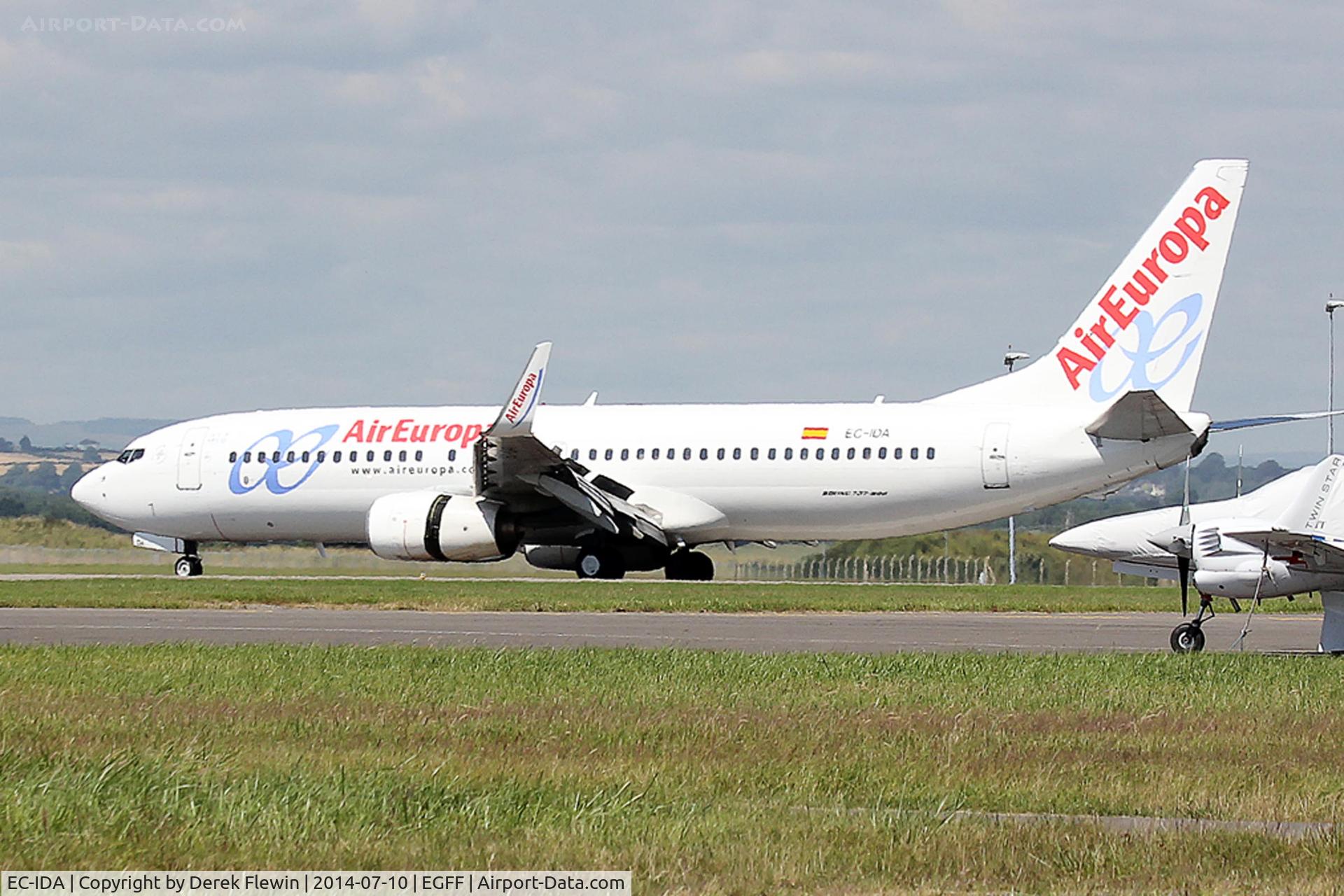 EC-IDA, 2002 Boeing 737-86Q C/N 32773, Boeing 737-86Q, call sign Europa 295, landing on runway 30 at EGFF, out of Palma Mallorca, seen with its reverse thruster doors open.