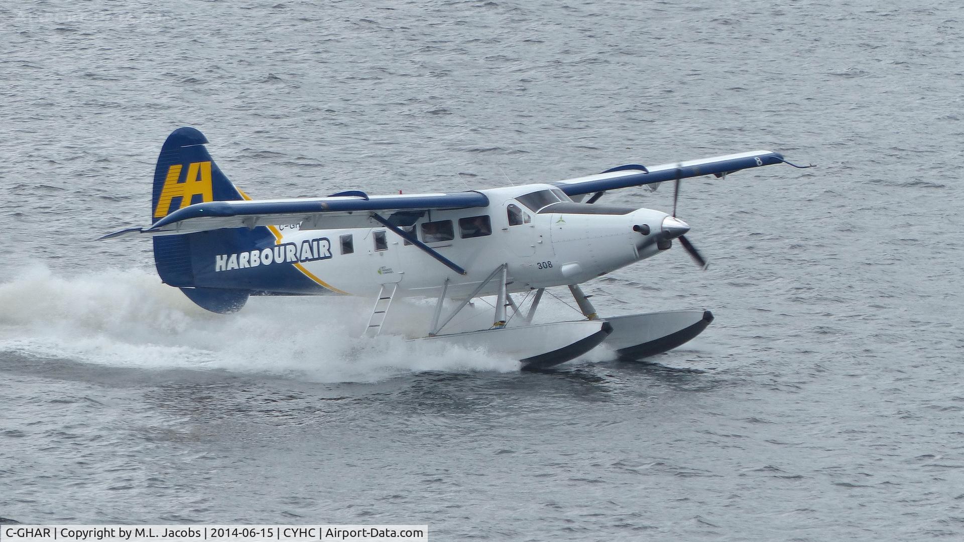 C-GHAR, 1954 De Havilland Canada DHC-3 Otter C/N 42, Harbour Air #308 just landed in Coal Harbour on an overcast afternoon.