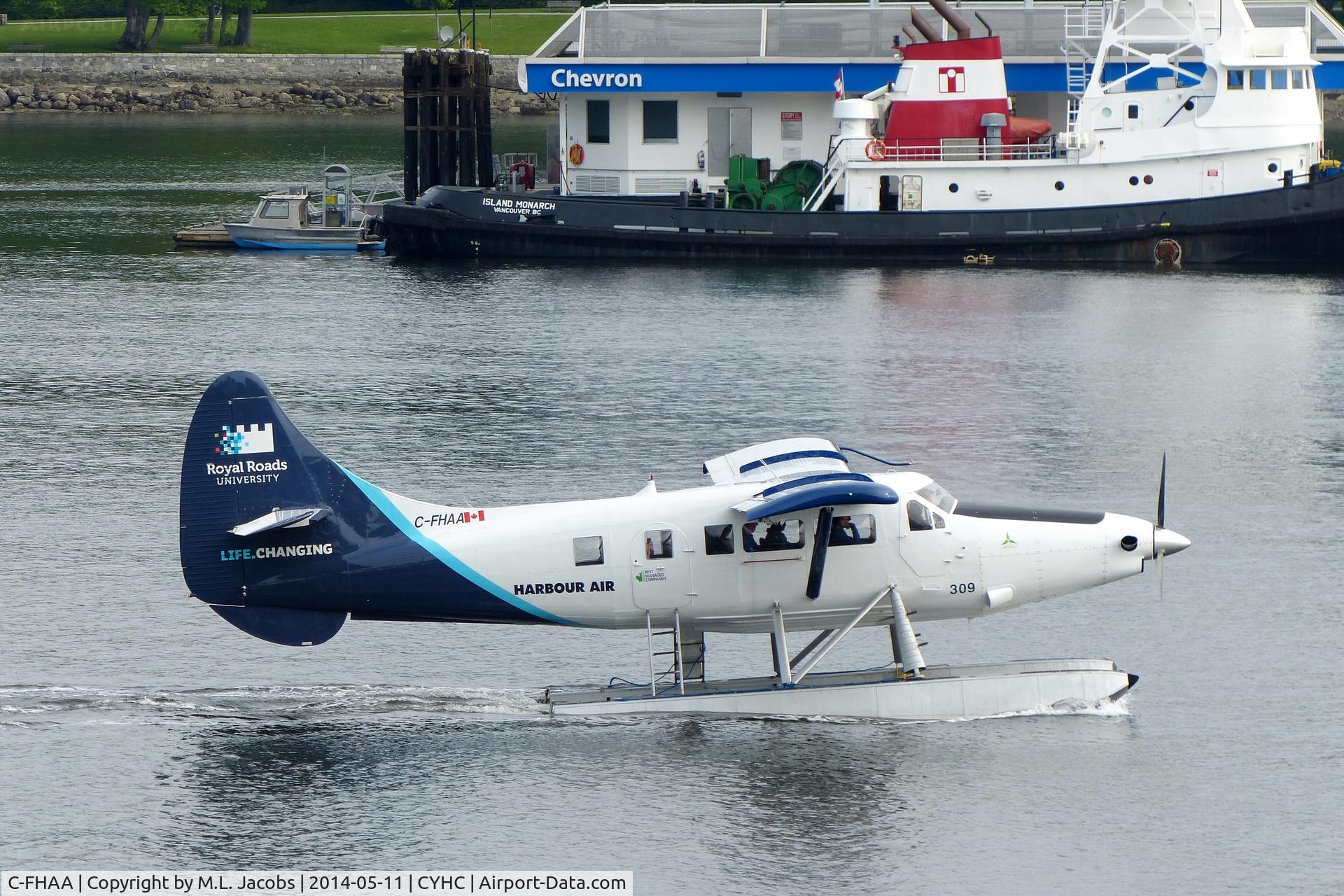 C-FHAA, 1960 De Havilland Canada DHC-3T Vazar Turbine Otter Otter C/N 357, Harbour Air #309 taxiing to position for takeoff in Coal Harbour.