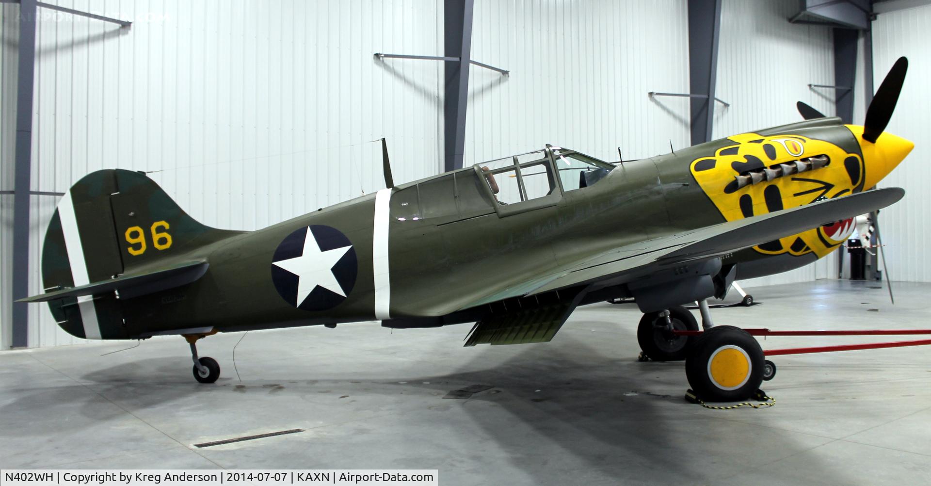 N402WH, 1942 Curtiss P-40K-10 Warhawk C/N 12467, Curtiss Wright P-40K-10 Warhawk in the community hangar.