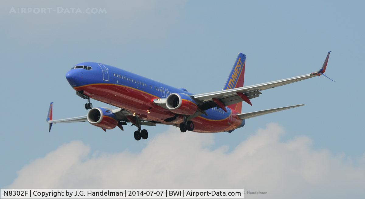 N8302F, 2012 Boeing 737-8H4 C/N 36680, Scimitar winglets on final to 33L.
