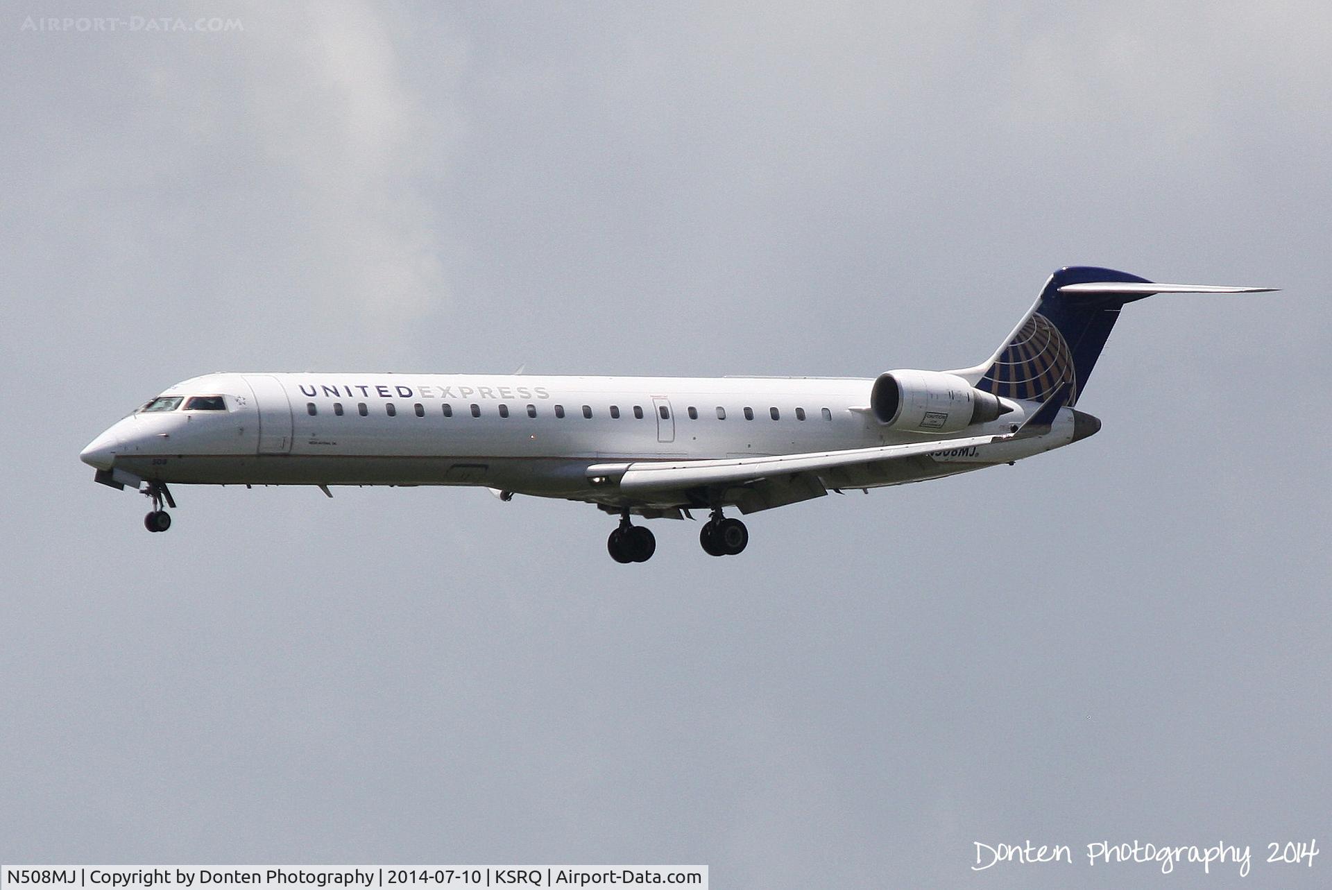 N508MJ, 2003 Bombardier CRJ-700 (CL-600-2C10) Regional Jet C/N 10087, United Flight 3799 operated by Mesa (N508MJ) arrives at Sarasota-Bradenton International Airport following a flight from Chicago-O'Hare International Airport