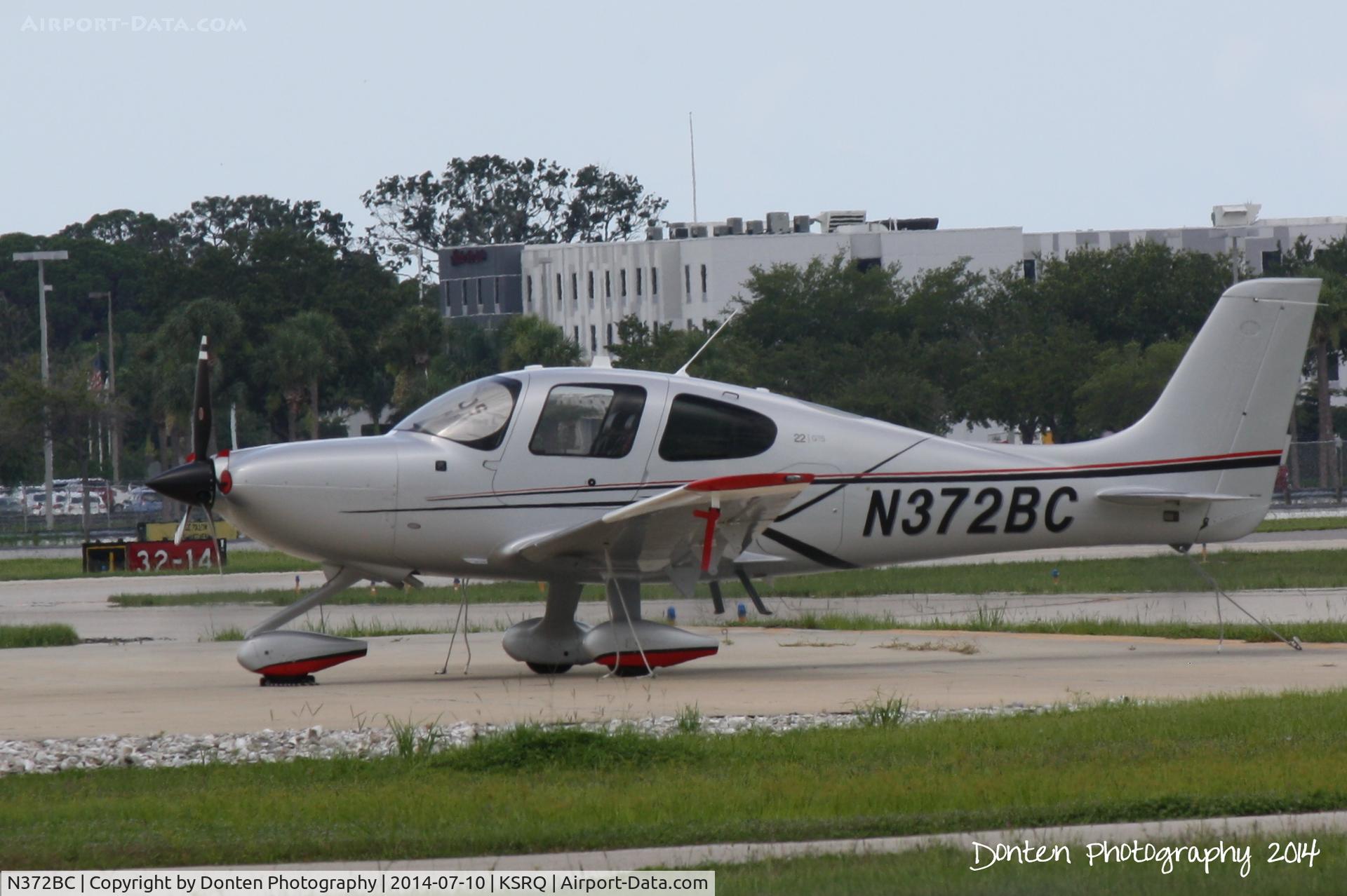 N372BC, 2014 Cirrus SR22 C/N 4068, Cirrus SR-22 (N372BC) sits on the ramp at Sarasota-Bradenton International Airport