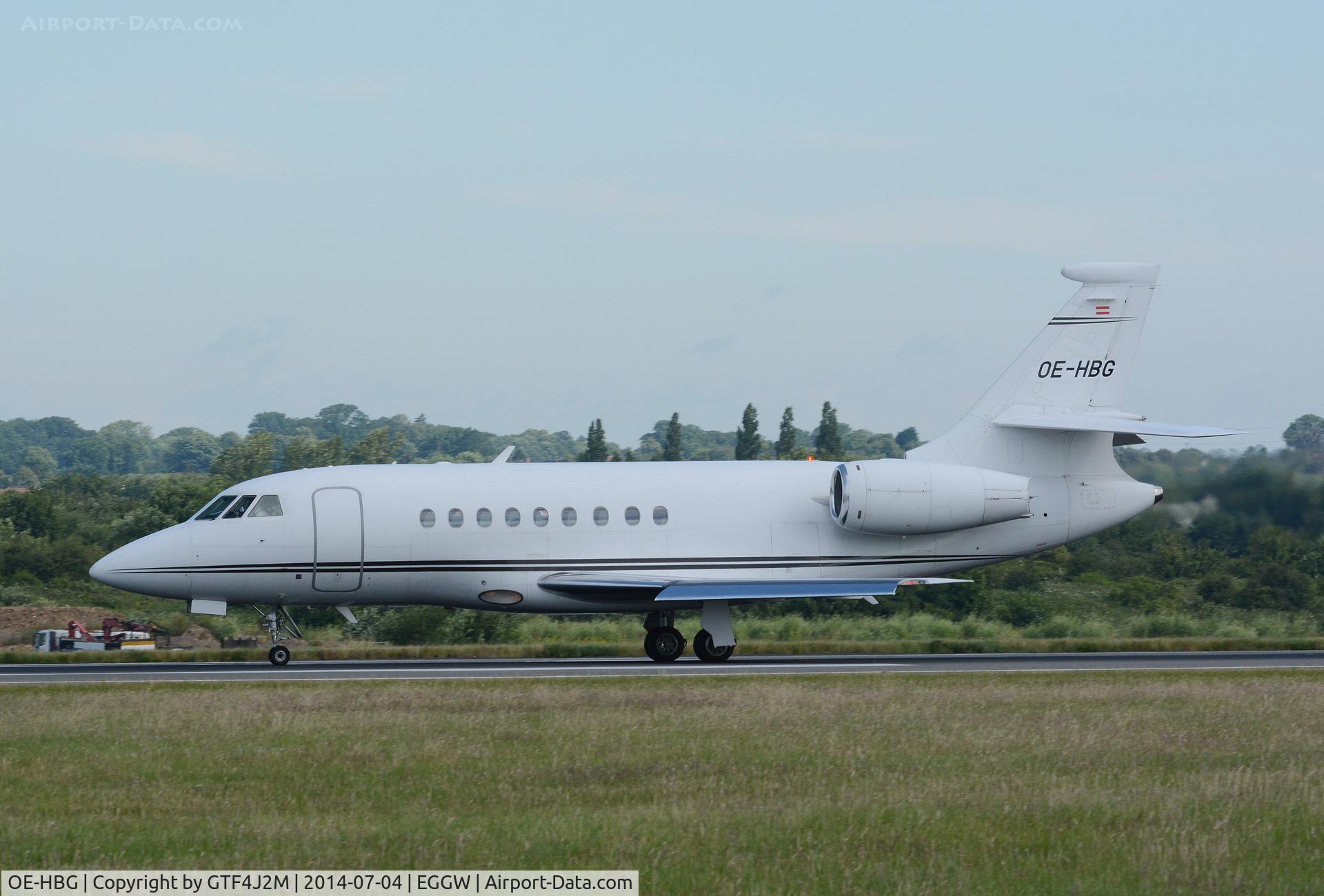 OE-HBG, 2003 Dassault Falcon 2000 C/N 207, OE-HBG departs Luton 4.7.14