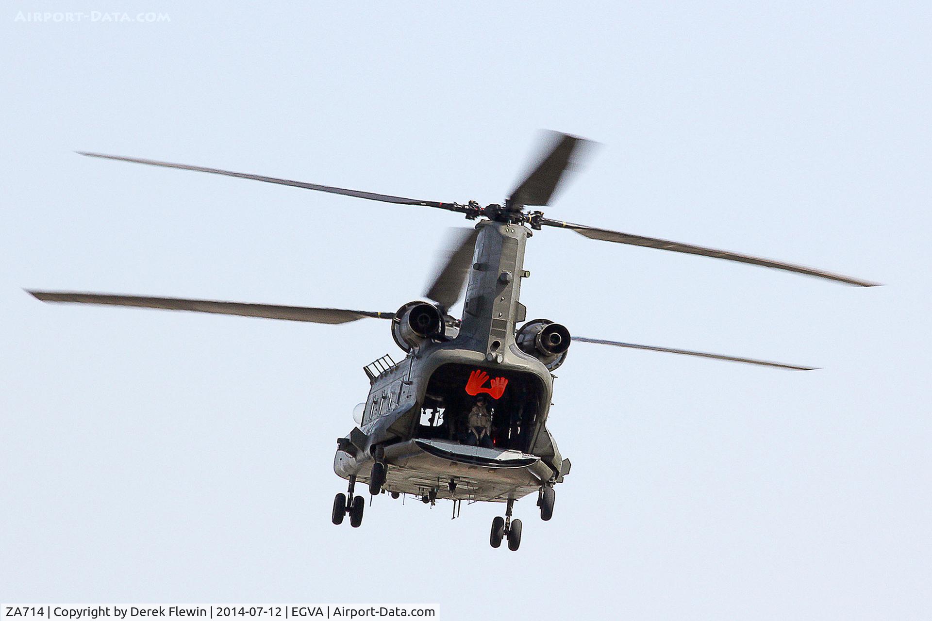 ZA714, Boeing Vertol Chinook HC.4 C/N MA026/M7005, RIAT 2014, Chinook HC.2, Air Load Master Sergeant Anna Irwin, seen waving on the ramp.