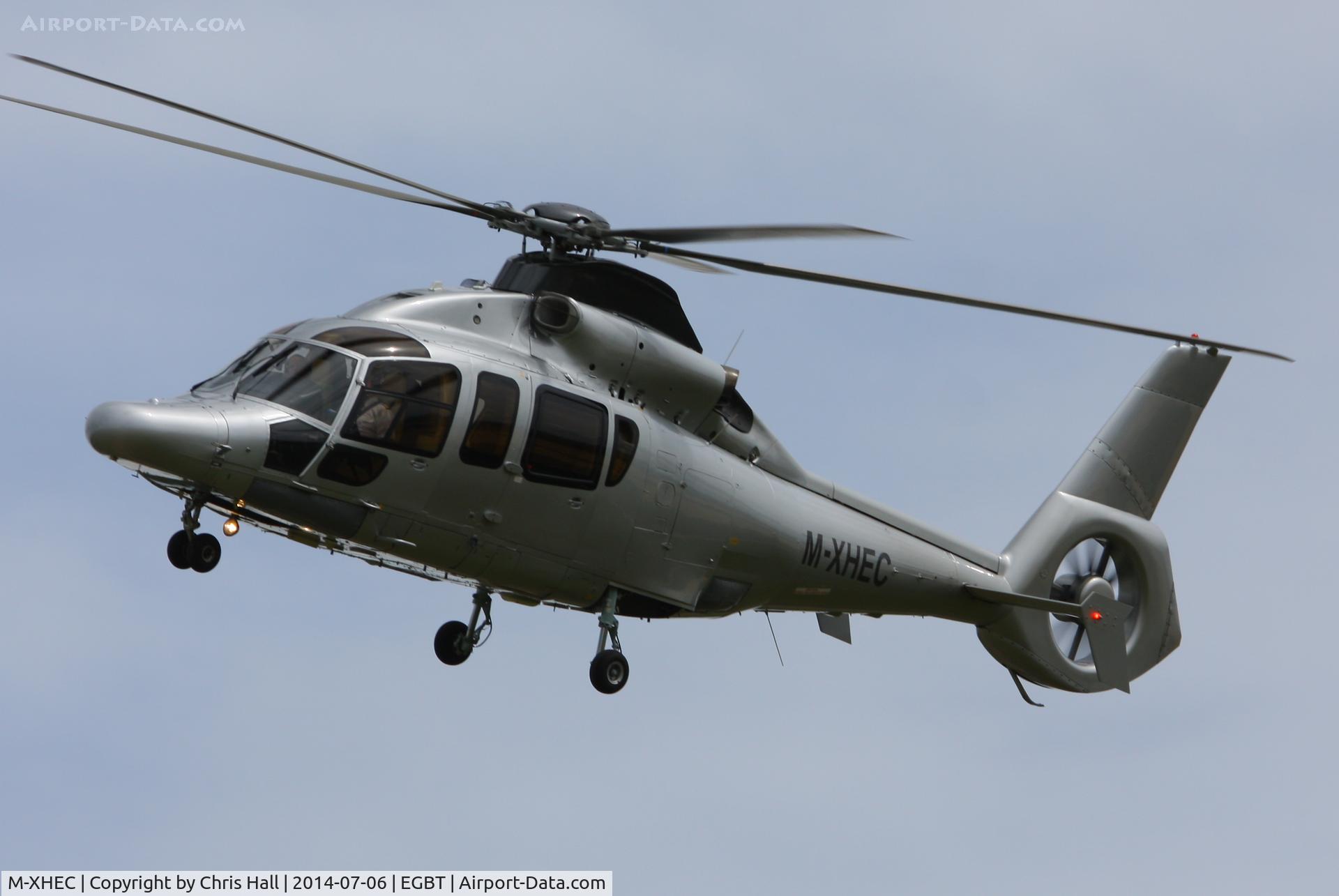 M-XHEC, Eurocopter EC-155B C/N 6600, being used for ferrying race fans to the British F1 Grand Prix at Silverstone
