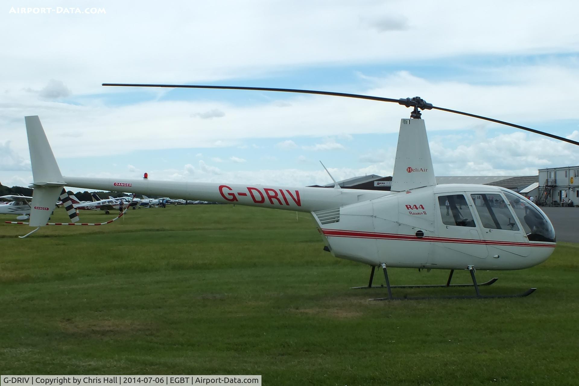 G-DRIV, 2003 Robinson R44 Raven II C/N 10126, ferrying race fans to the British F1 Grand Prix at Silverstone
