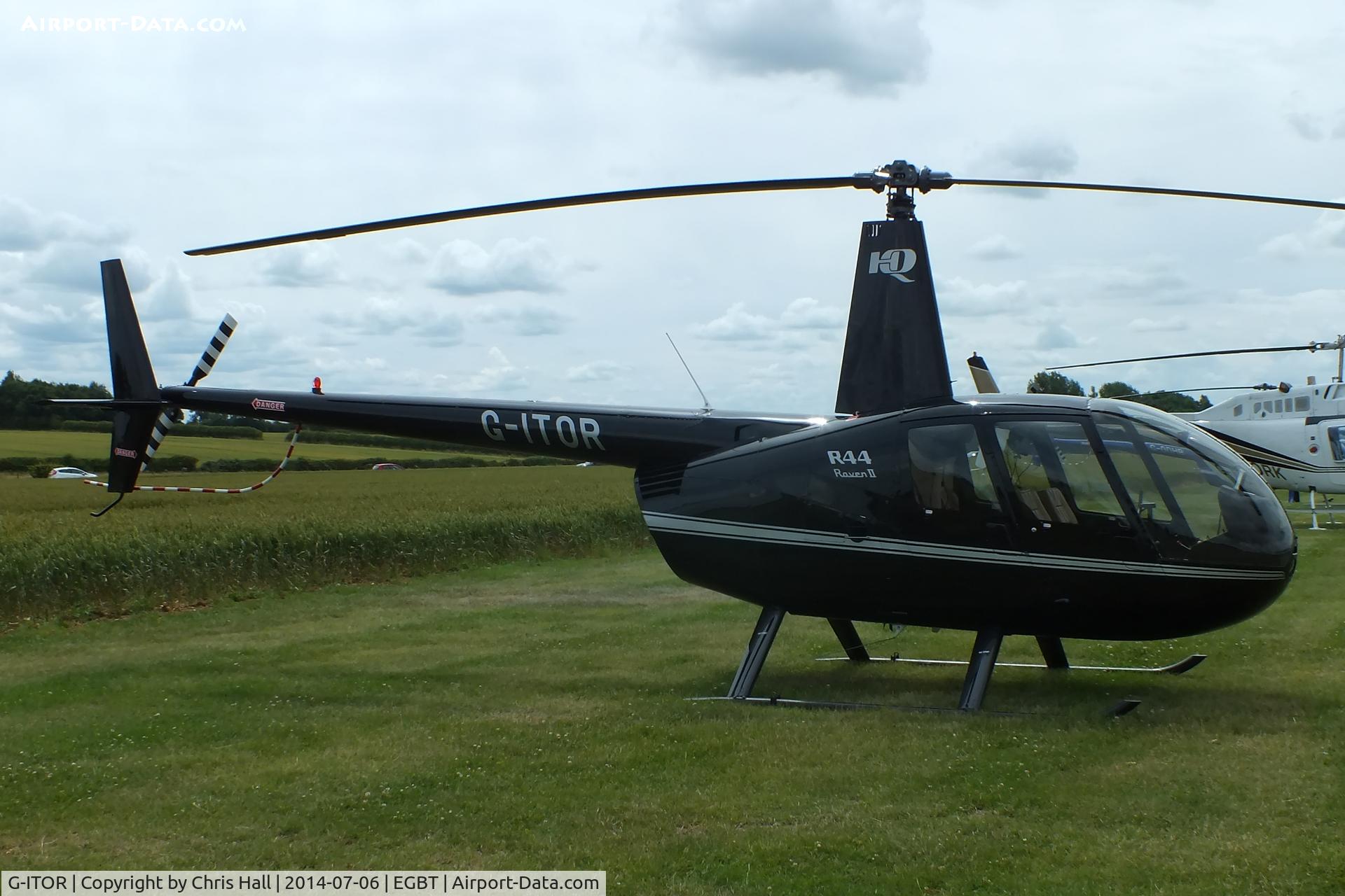 G-ITOR, 2006 Robinson R44 Raven II C/N 11498, ferrying race fans to the British F1 Grand Prix at Silverstone