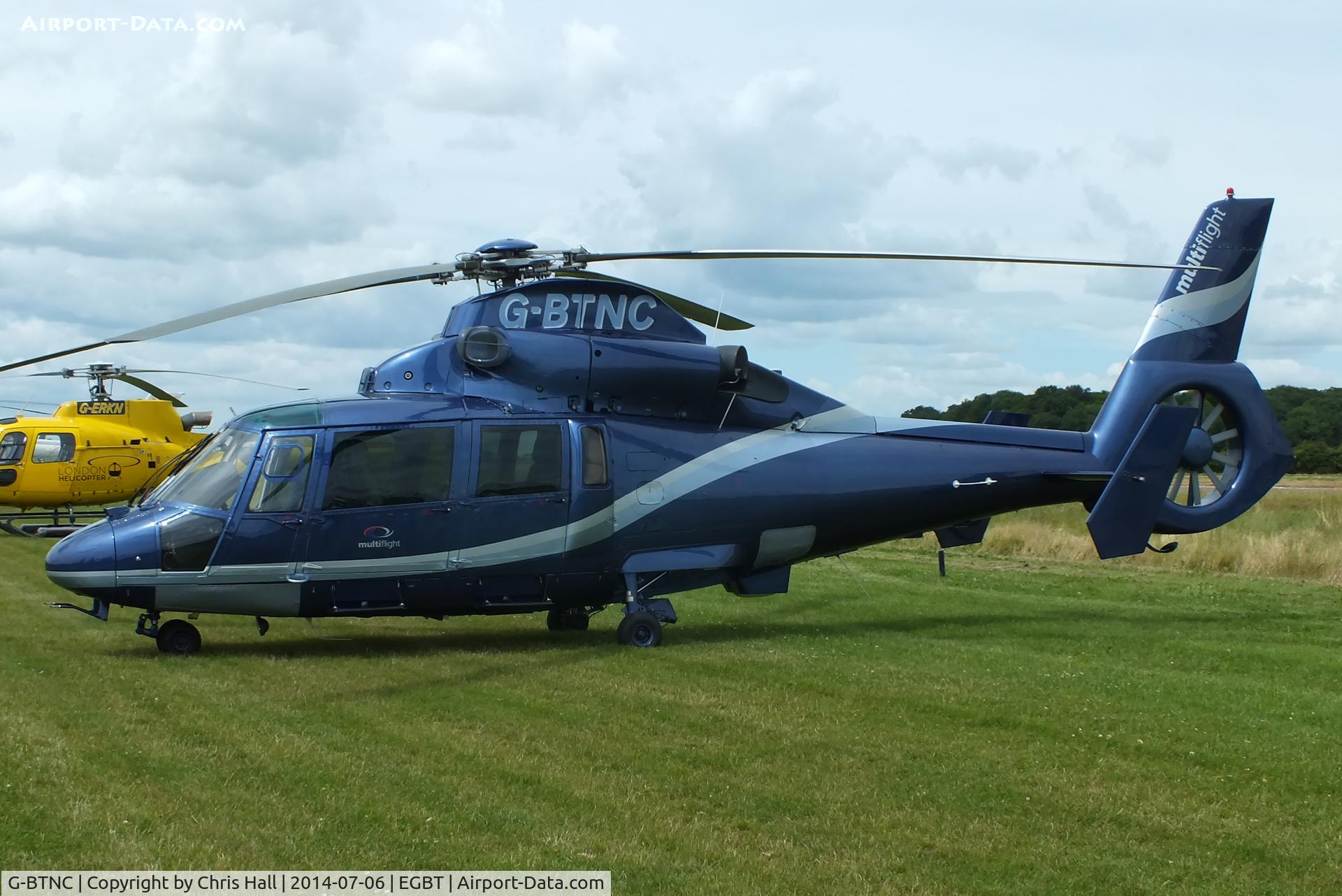 G-BTNC, 1991 Aerospatiale AS-365N-2 Dauphin C/N 6409, ferrying race fans to the British F1 Grand Prix at Silverstone