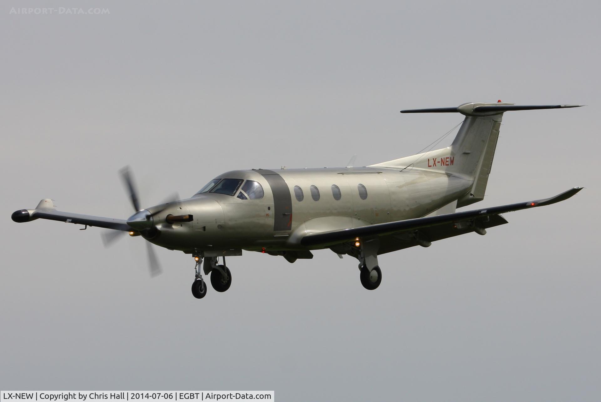 LX-NEW, 2009 Pilatus PC-12/47E C/N 1148, bringing race fans to the British F1 Grand Prix at Silverstone