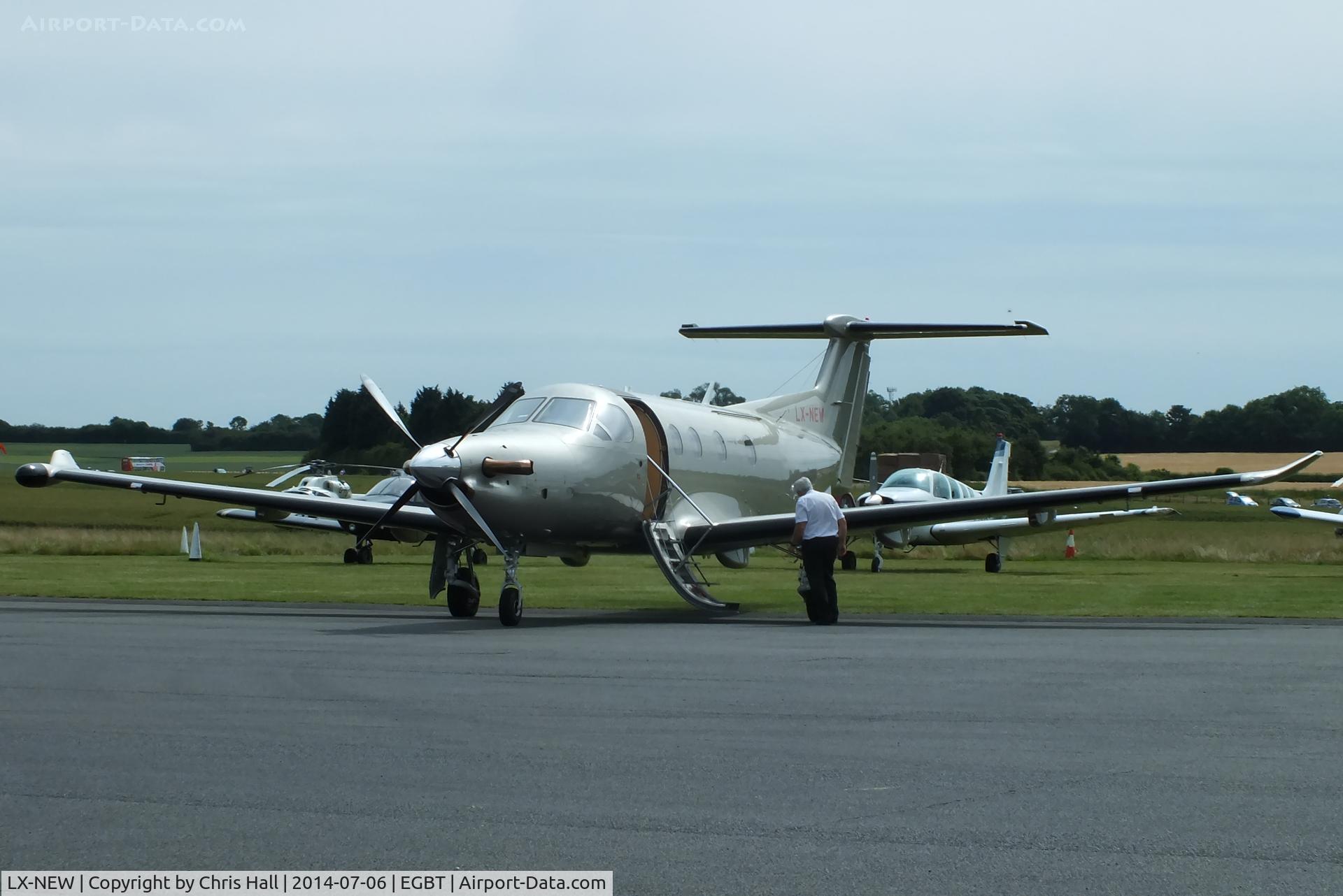 LX-NEW, 2009 Pilatus PC-12/47E C/N 1148, bringing race fans to the British F1 Grand Prix at Silverstone