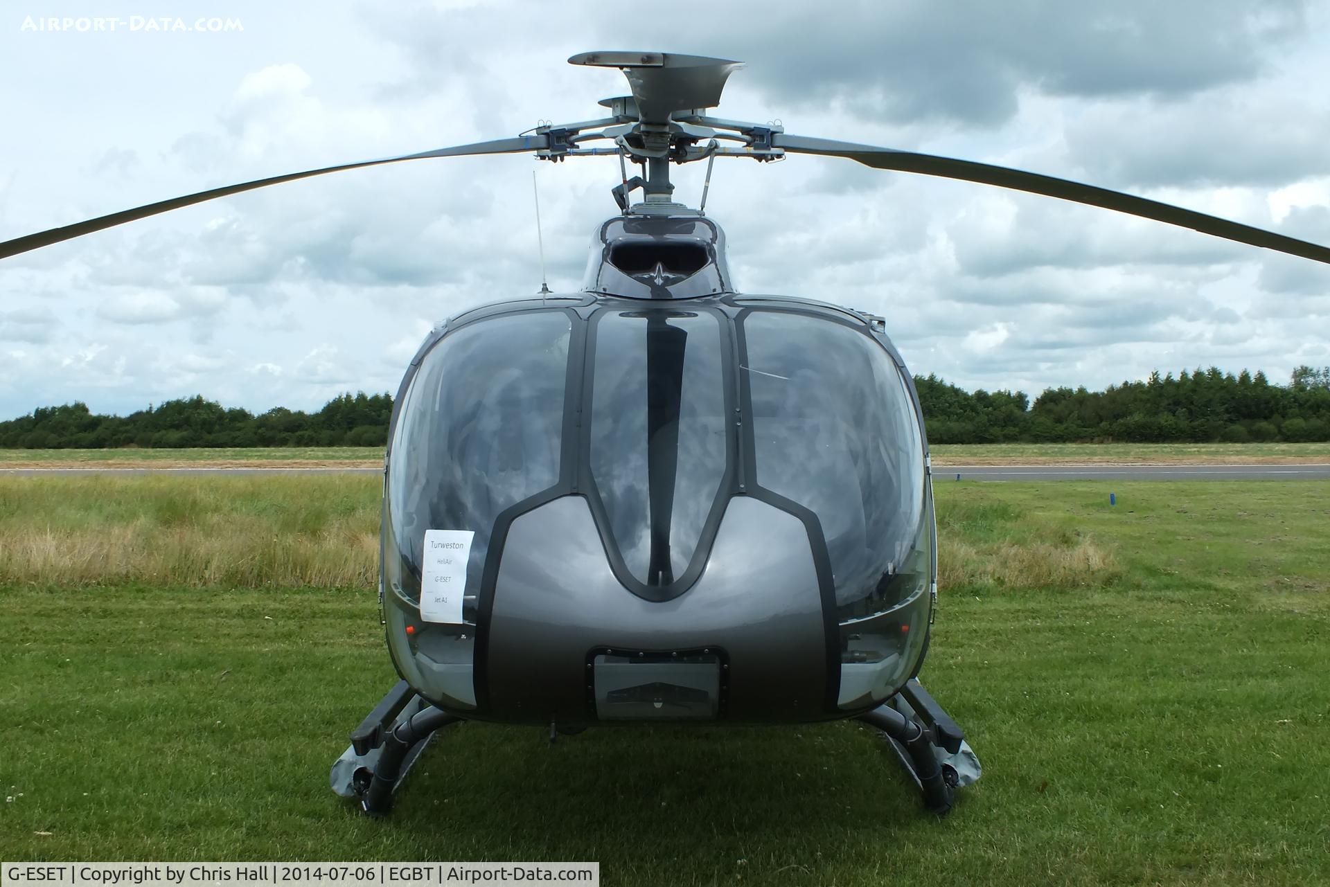 G-ESET, 2009 Eurocopter EC-130B-4 (AS-350B-4) C/N 4817, ferrying race fans to the British F1 Grand Prix at Silverstone