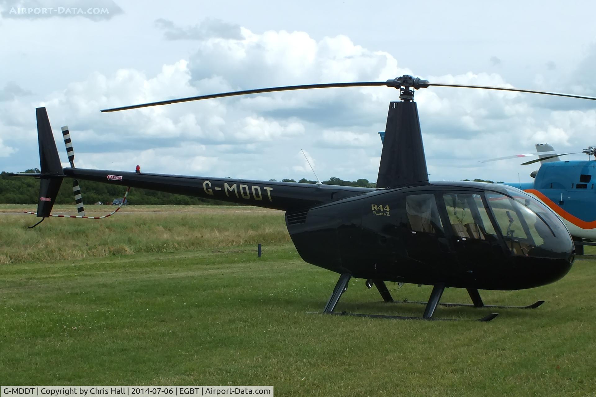 G-MDDT, 2006 Robinson R44 Raven II C/N 11474, ferrying race fans to the British F1 Grand Prix at Silverstone