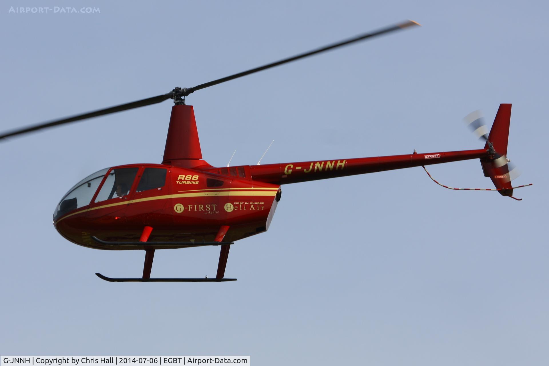 G-JNNH, 2011 Robinson R66 Turbine C/N 0016, ferrying race fans to the British F1 Grand Prix at Silverstone