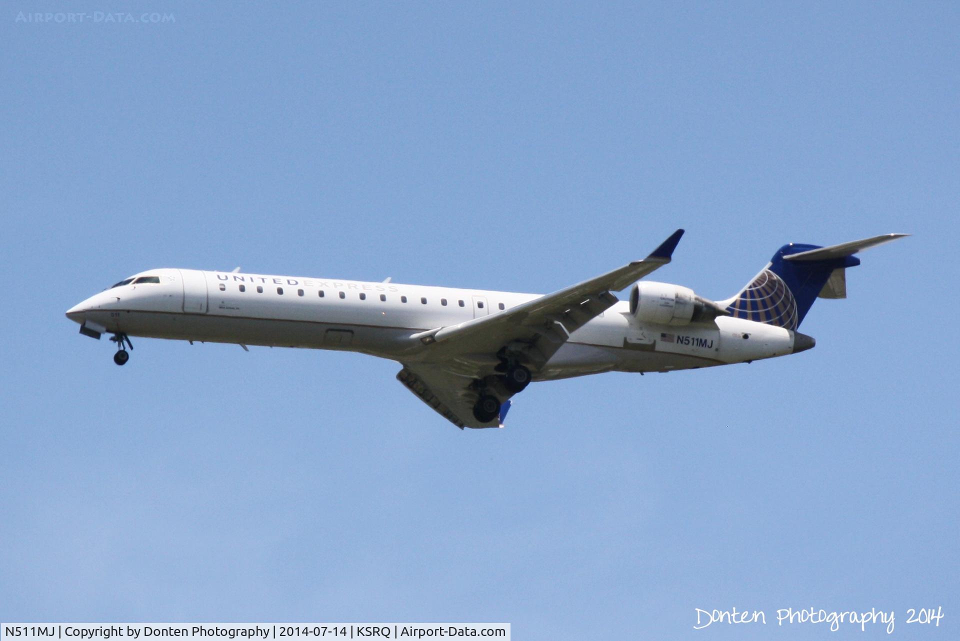 N511MJ, 2003 Bombardier CRJ-700 (CL-600-2C10) Regional Jet C/N 10104, United Flight 3799 operated by Mesa (N511MJ) arrives at Sarasota-Bradenton International Airport following a flight from Chicago-O'Hare International Airport