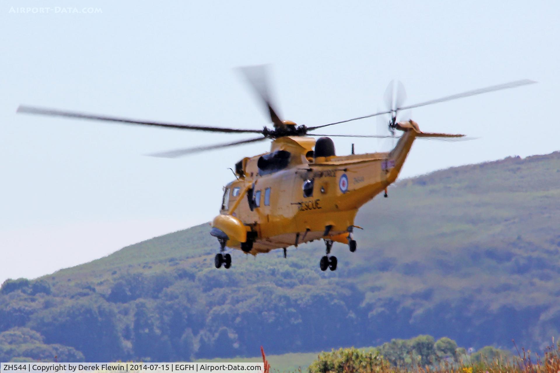 ZH544, Westland Sea King HAR.3A C/N WA1010, Sea King HAR.3A, call sign Rescue 169, seen departing runway 04 at EGFH, en-route to Port Eynon to pick up a casualty, then to A&E Morriston Hospital.