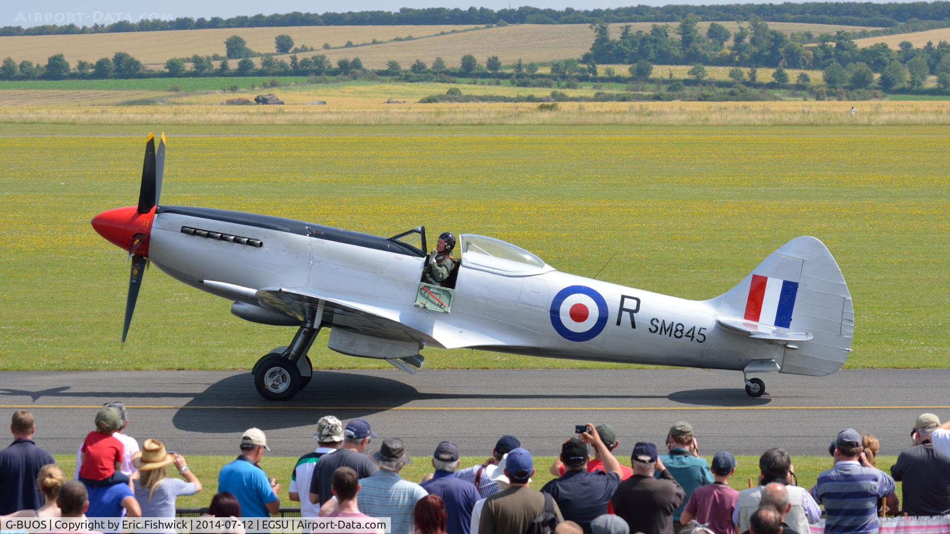 G-BUOS, 1945 Supermarine 394 Spitfire FR.XVIIIe C/N 6S/672224, 5. G-BUOS with a highly appreciative crowd at The Flying Legends Air Show, IWM Duxford. July,2014.