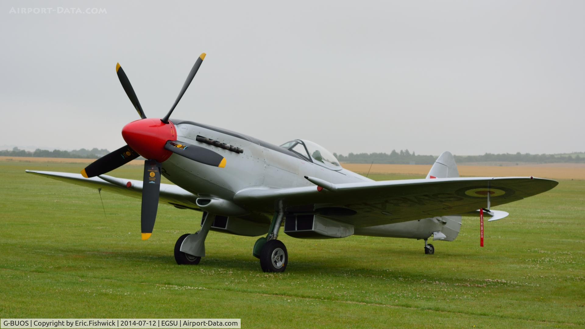 G-BUOS, 1945 Supermarine 394 Spitfire FR.XVIIIe C/N 6S/672224, 3. G-BUOS emerging from the morning mist at The Flying Legends Air Show, IWM Duxford. July,2014.