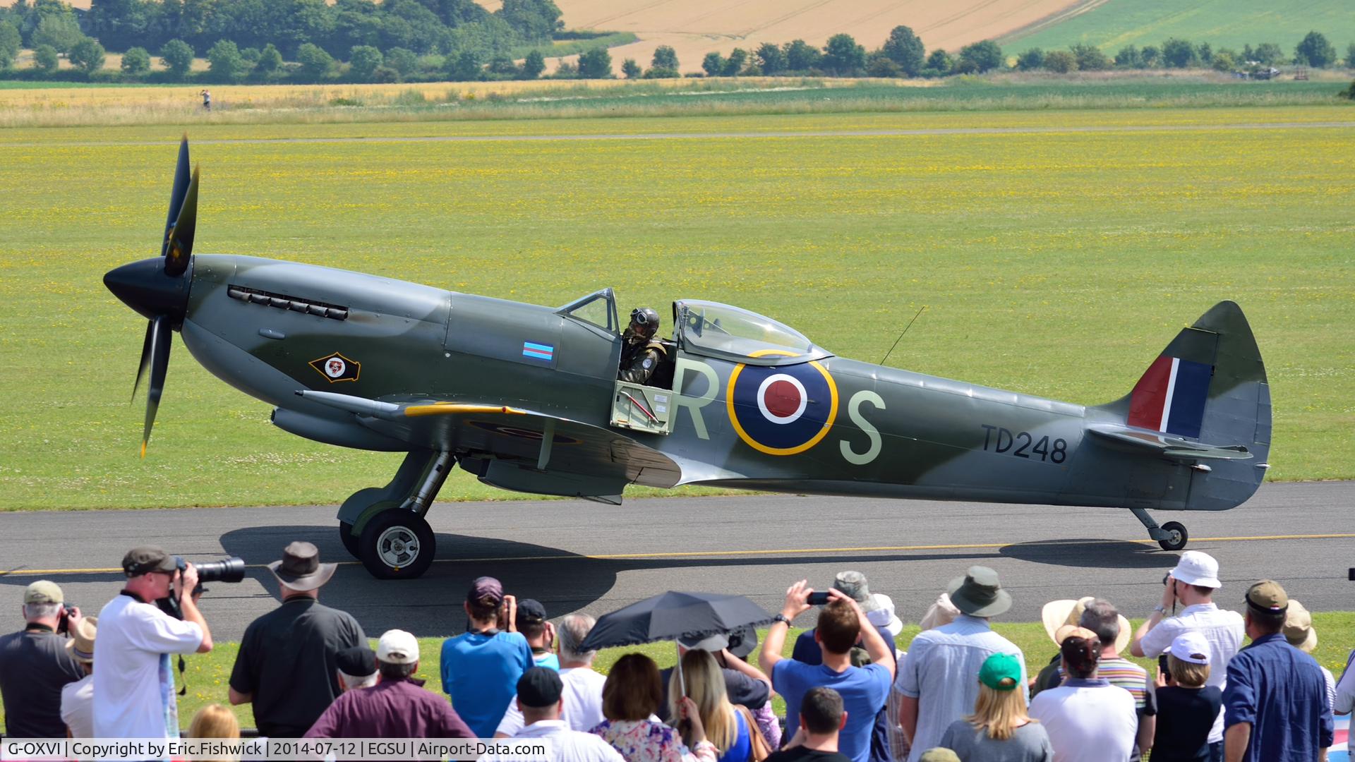 G-OXVI, 1945 Supermarine 361 Spitfire LF.XVIe C/N CBAF.IX.4262, 5. TD248 with a highly appreciative crowd at The Flying Legends Air Show, IWM Duxford. July,2014.