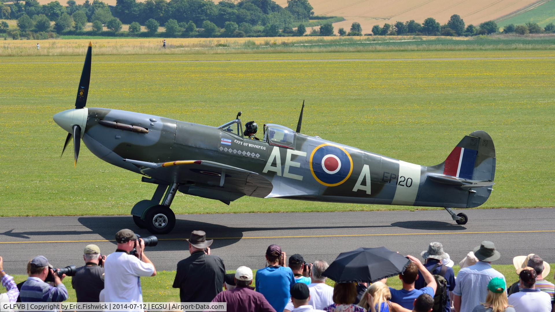 G-LFVB, 1942 Supermarine 349 Spitfire LF.Vb C/N CBAF.2403, 5. EP120 with a highly appreciative crowd at The Flying Legends Air Show, IWM Duxford. July,2014.