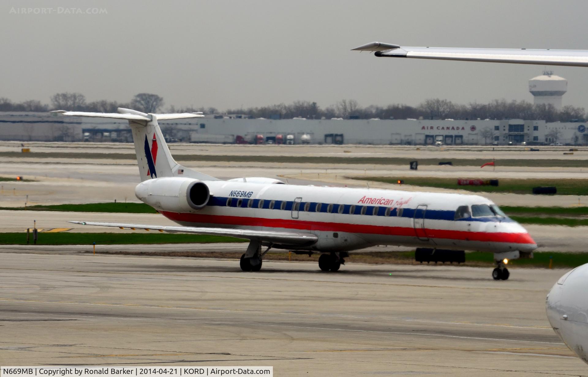 N669MB, 2004 Embraer ERJ-145LR (EMB-145LR) C/N 145788, Taxi O'Hare