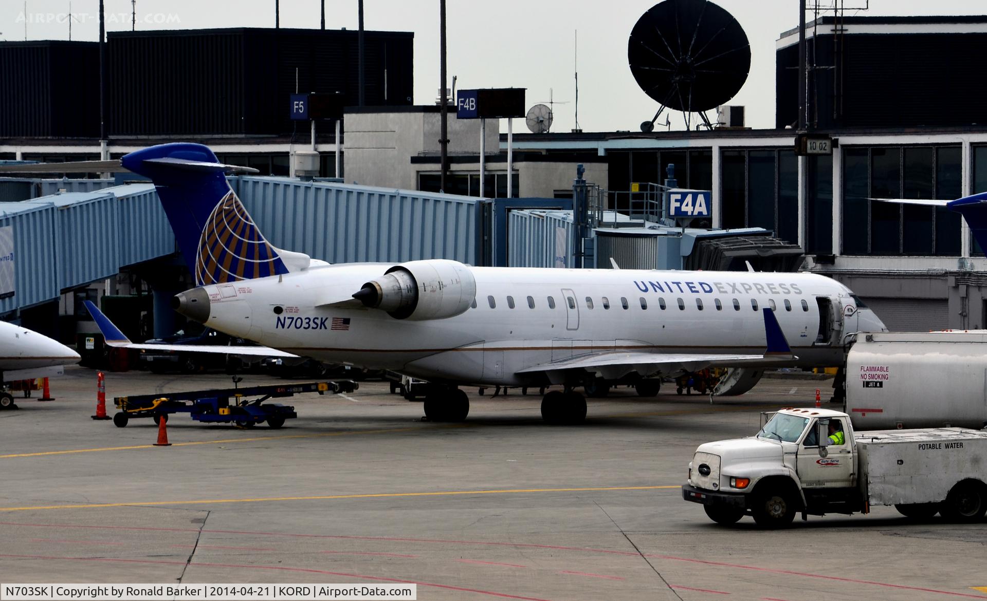 N703SK, 2004 Bombardier CRJ-701ER (CL-600-2C10) Regional Jet C/N 10139, Gate F4A O'Hare