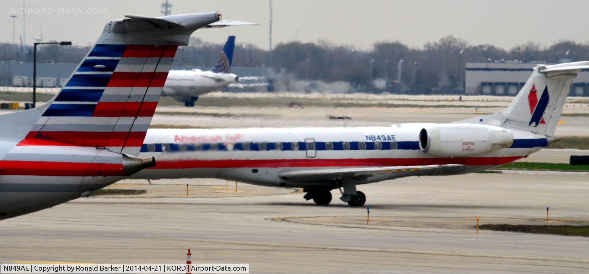 N849AE, 2003 Embraer ERJ-140LR (EMB-135KL) C/N 145716, Taxi O'Hare