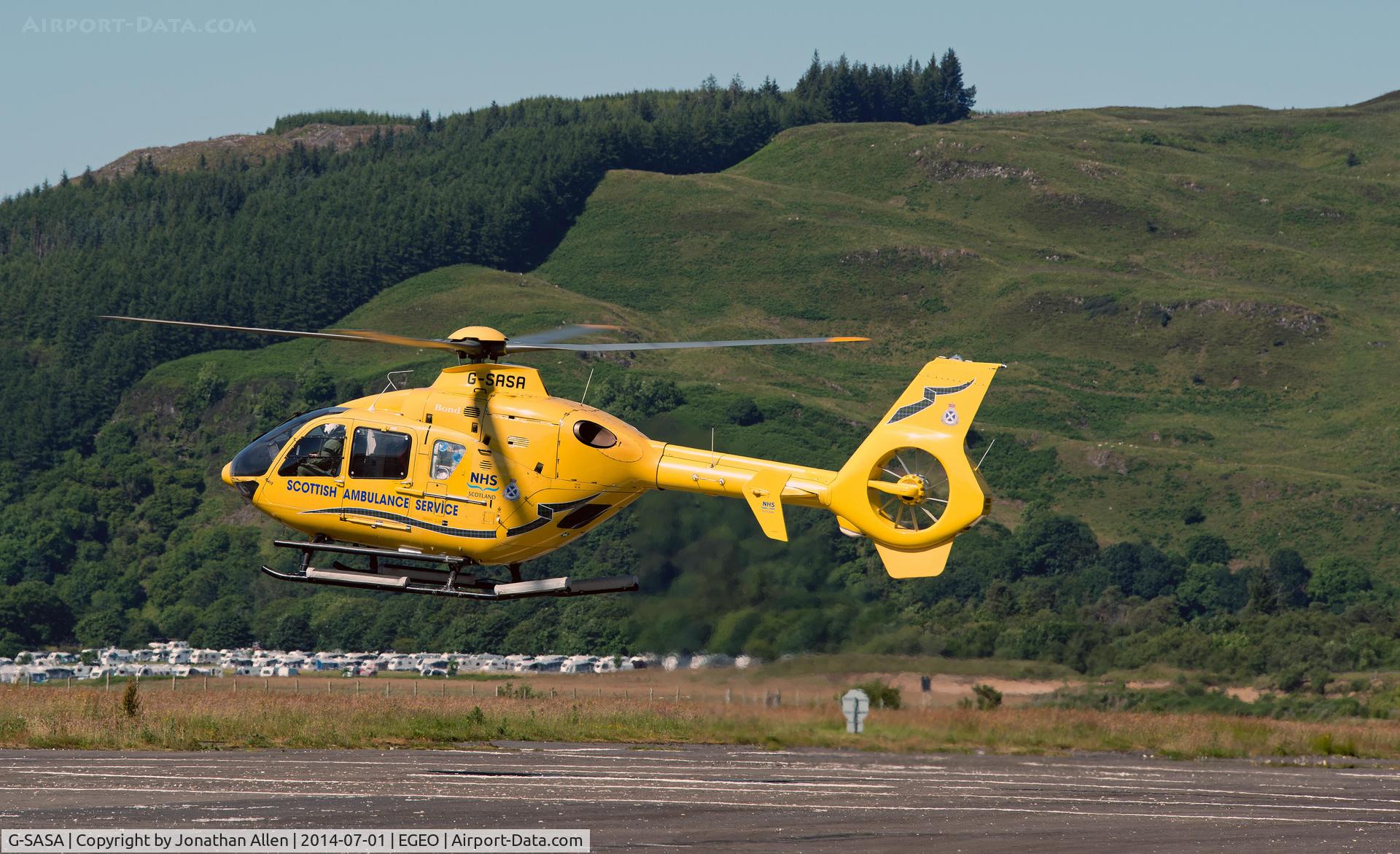 G-SASA, 2000 Eurocopter EC-135T-2 C/N 0147, Lifting-off from Oban Airport heading to Barra.