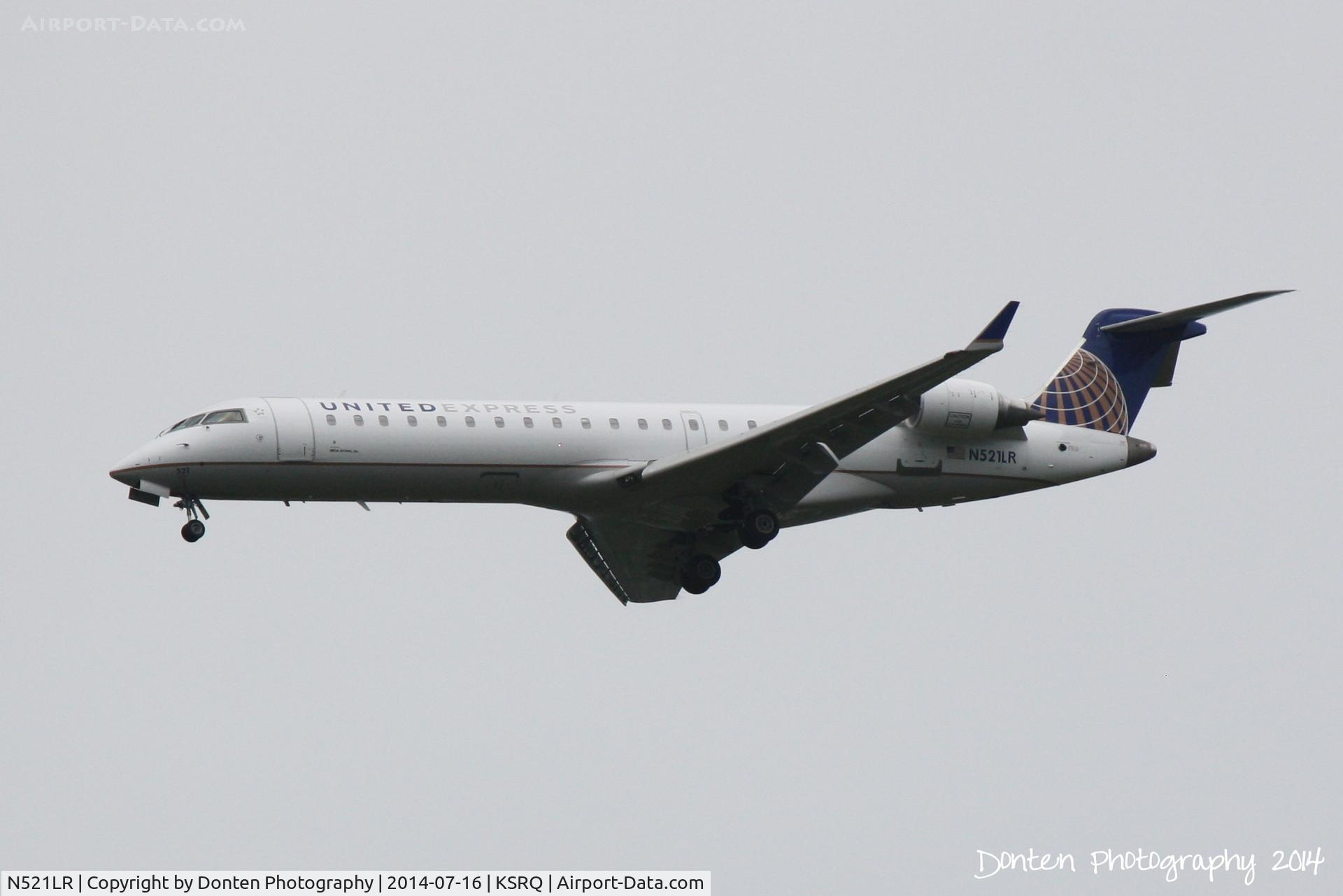 N521LR, 2006 Canadair CL-600 2C10 CRJ-701ER C/N 10261, United Flight 3799 operated by Mesa (N521LR) arrives at Sarasota-Bradenton International Airport following a flght from Chicago-O'Hare International Airport