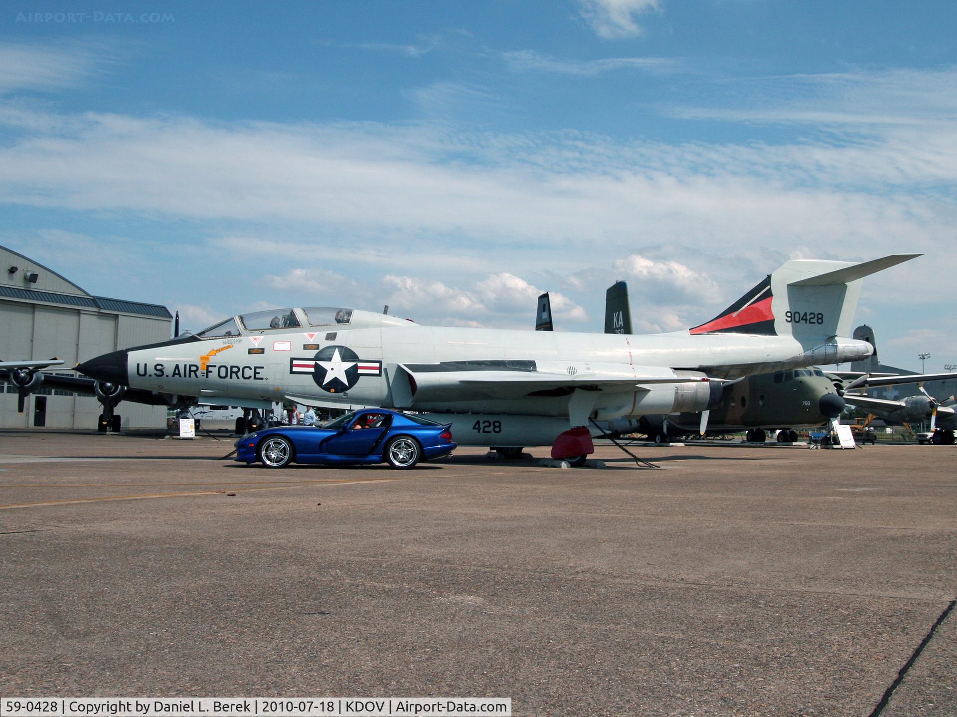 59-0428, McDonnell F-101B Voodoo C/N 752, The shiny sports car might be fast, but the antique 