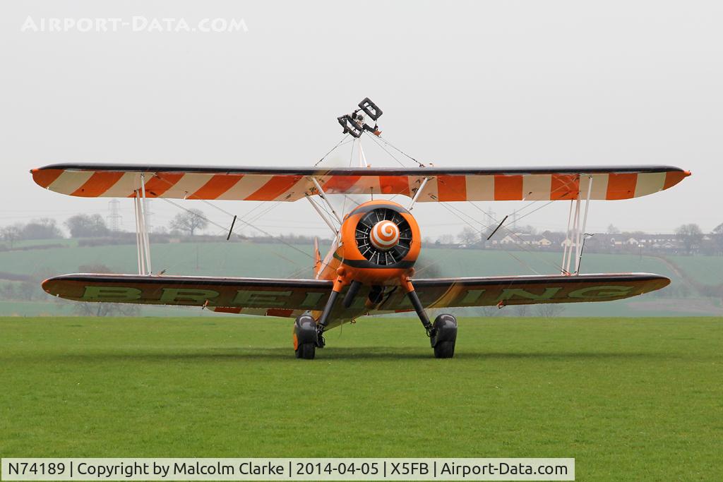 N74189, 1941 Boeing PT-17/R985 Kaydet (A75N1) C/N 75-717, Boeing PT-17 overnighting at Fishburn Airfield prior to a first UK performance in 2014 at Littlehaven's Promenade & Seawall opening celebrations, South Shields. April 5th 2014.