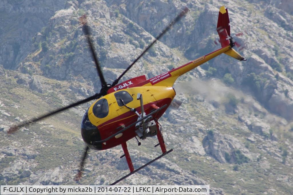 F-GJLX, Hughes 369D C/N 91-1058D, In flight