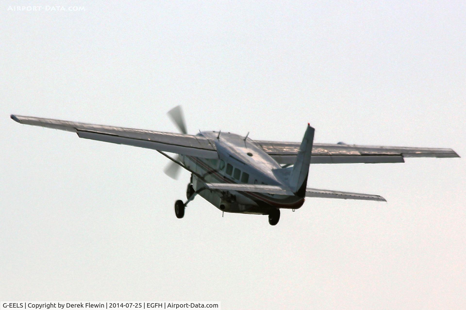 G-EELS, 1997 Cessna 208B Grand Caravan C/N 208B0619, Visiting Grand Caravan, temporally based at EGFH, seen departing runway 22 at EGFH, en-route to film the Senior Open Championship at Royal Porthcawl Golf club.
