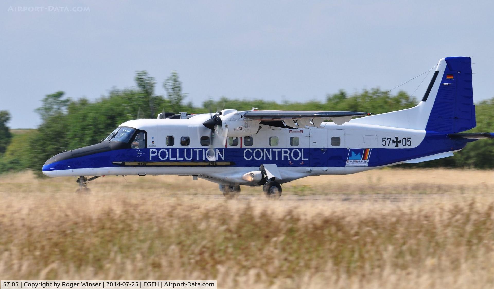 57 05, 2011 Dornier (RUAG) Do.228-212NG C/N 8302, German Navy Do 228 operated by Marinfliegergeschwader 3 for the Havariekommando (The Central Command for Maritime Emergencies) including pollution control makes a touch and go on Runway 22 en route to Yeovilton International Air Day.