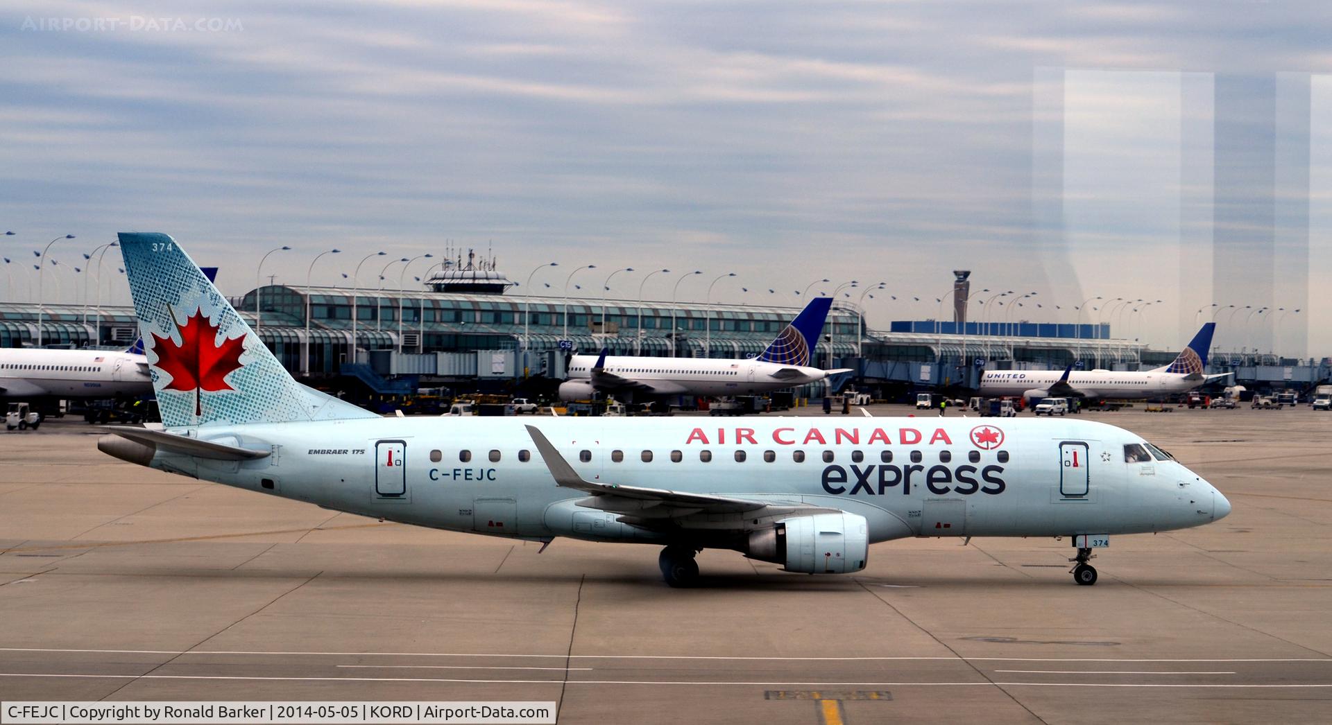 C-FEJC, 2005 Embraer 175SU (ERJ-170-200SU) C/N 17000089, Taxi to park O'Hare