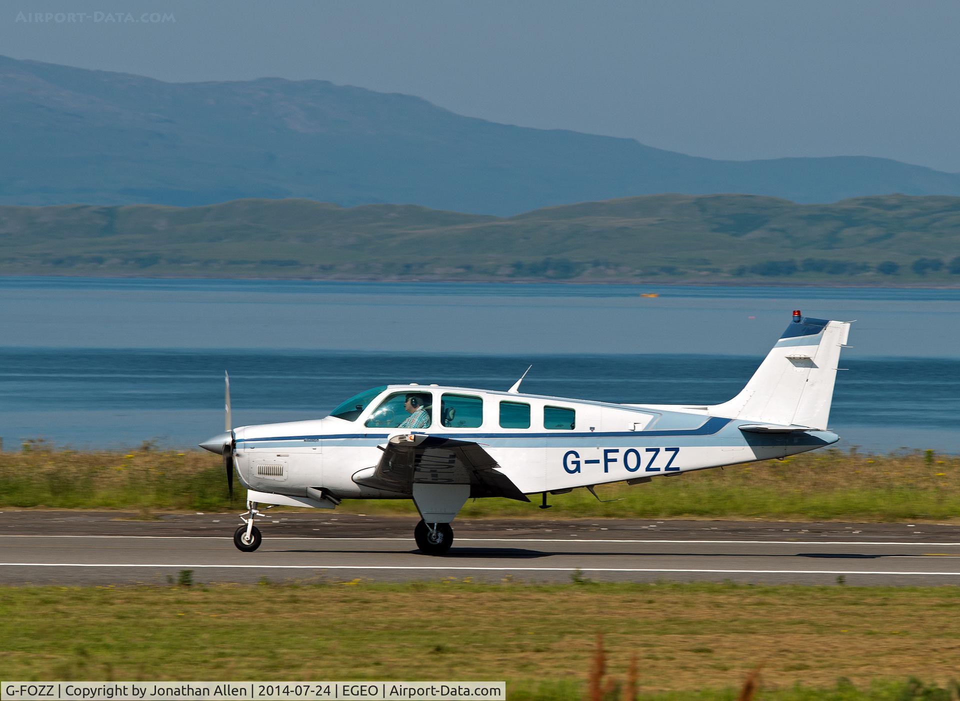 G-FOZZ, 1993 Beech A36 Bonanza 36 C/N E-2788, Heading down Runway 01 at Oban for take-off.
