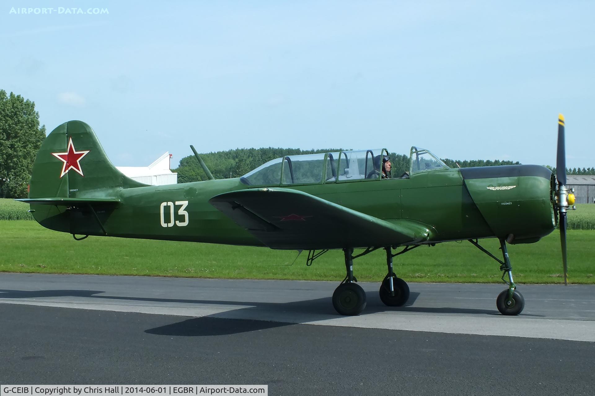 G-CEIB, 1958 Yakovlev Yak-18A C/N 1160403, at Breighton's Open Cockpit & Biplane Fly-in, 2014