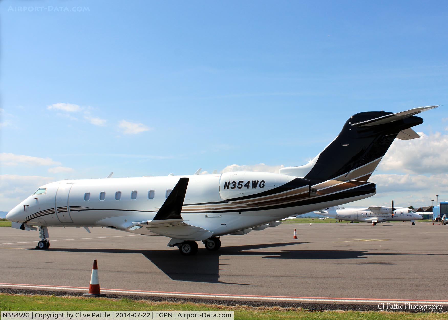 N354WG, 2012 Bombardier Challenger 300 (BD-100-1A10) C/N 20354, Pictured basking in the (rare) sun on the apron at Dundee Riverside EGPN