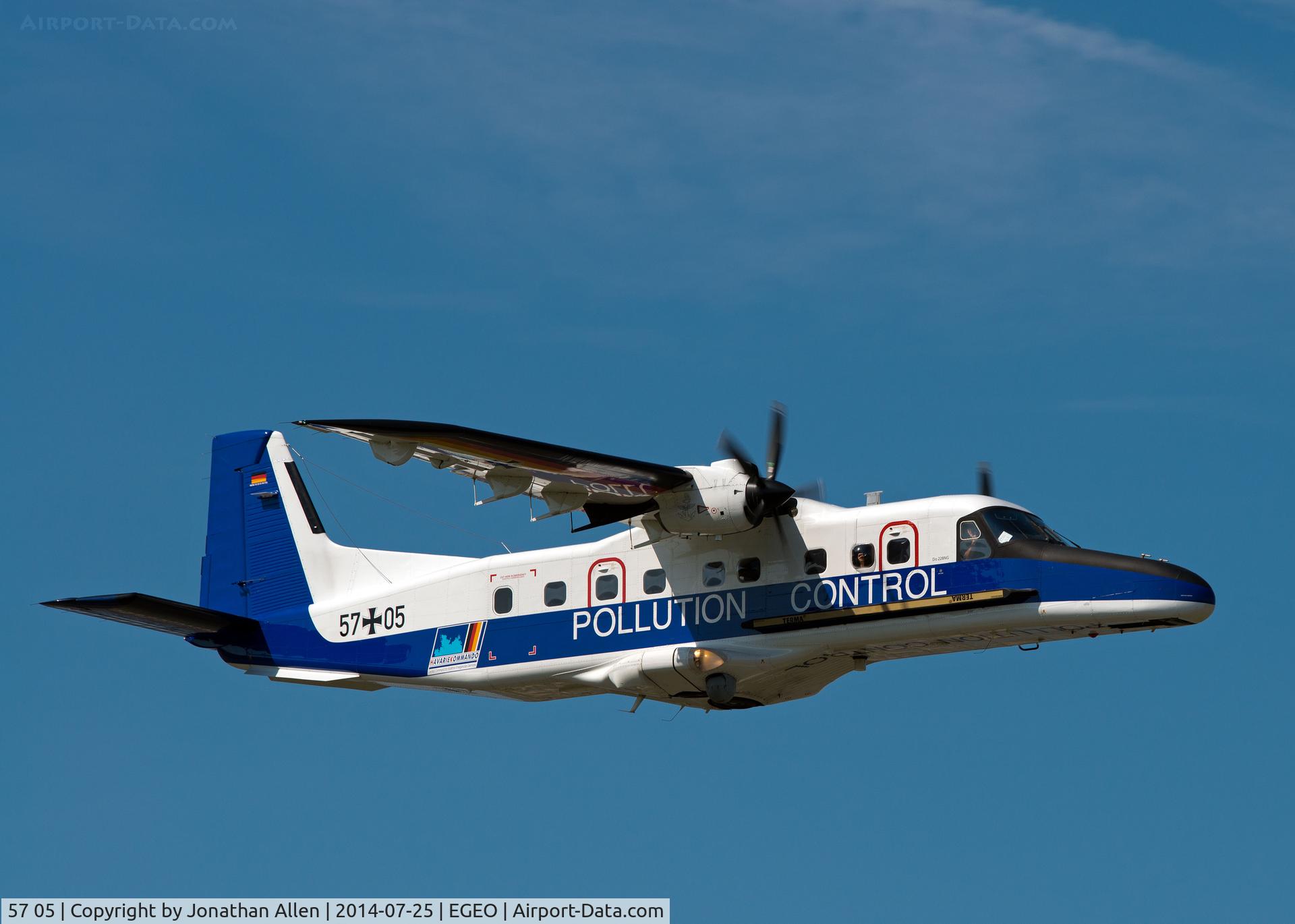 57 05, 2011 Dornier (RUAG) Do.228-212NG C/N 8302, Performing a low-level fly-past at Oban Airport.