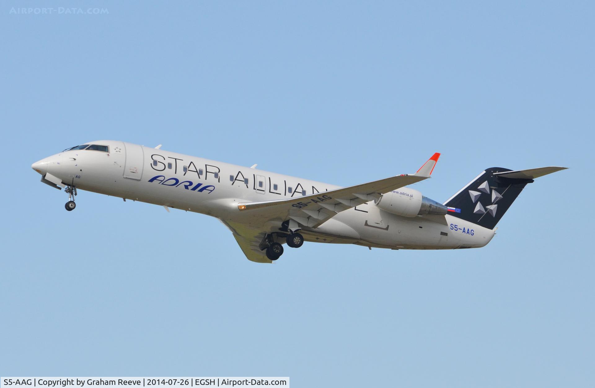 S5-AAG, 2000 Canadair CRJ-200LR (CL-600-2B19) C/N 7384, Just taken off from Norwich on runway 
