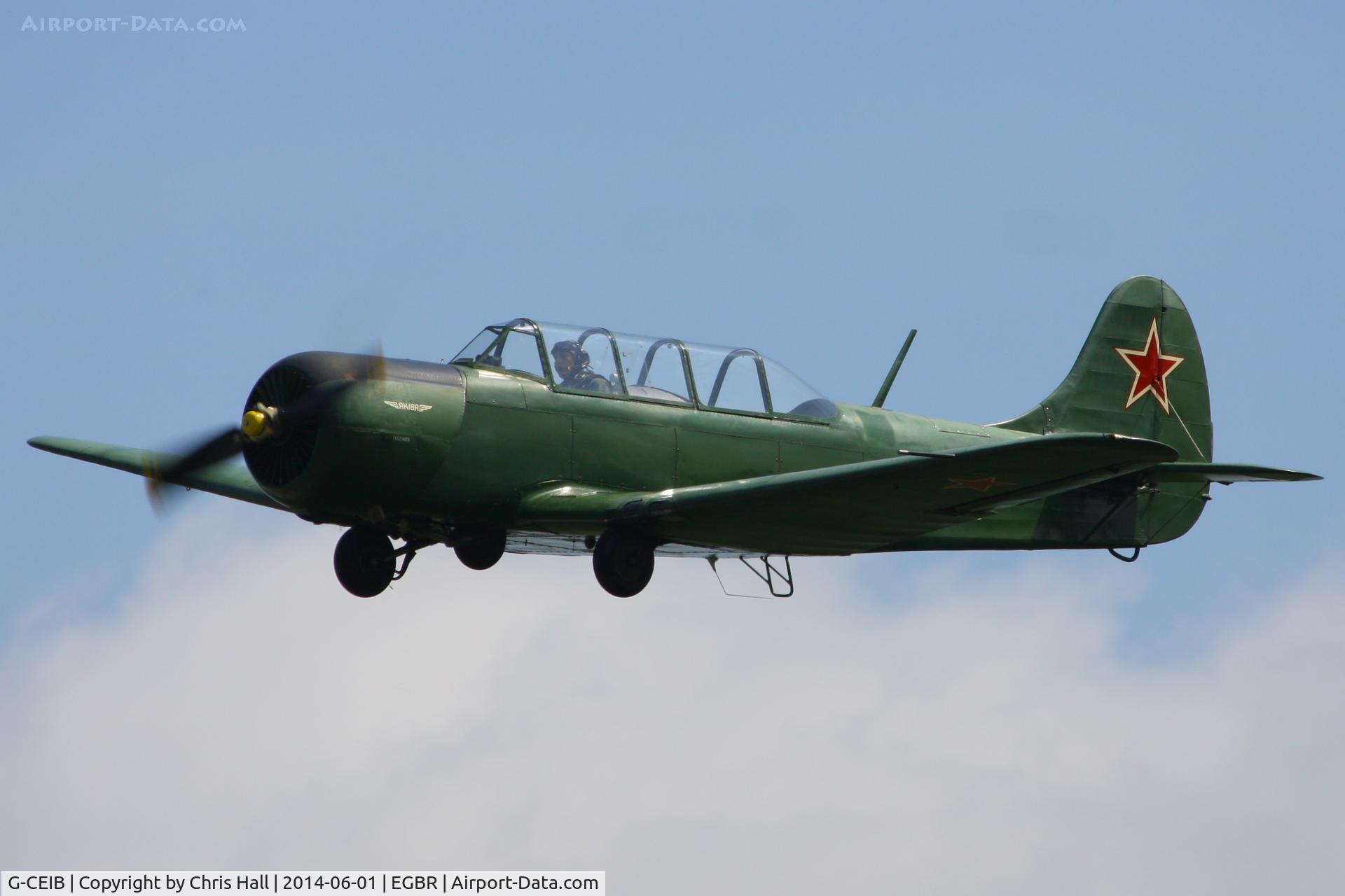 G-CEIB, 1958 Yakovlev Yak-18A C/N 1160403, at Breighton's Open Cockpit & Biplane Fly-in, 2014